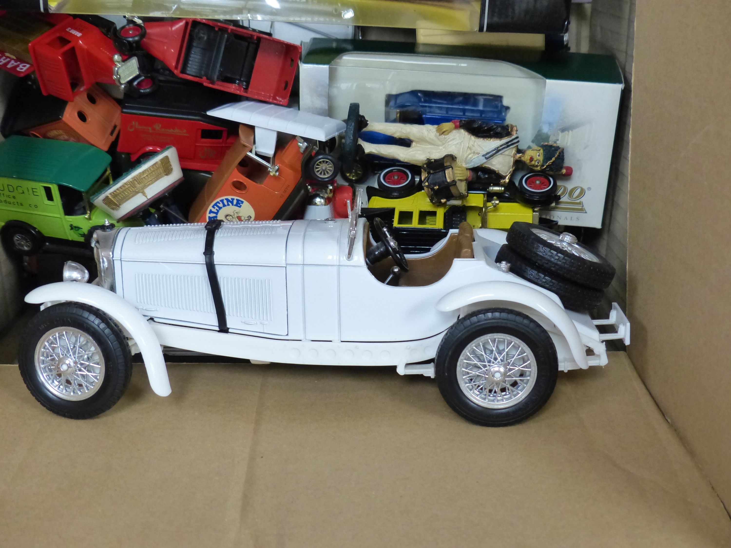 A collection of Matchbox, Dinky and other model cars and other toys